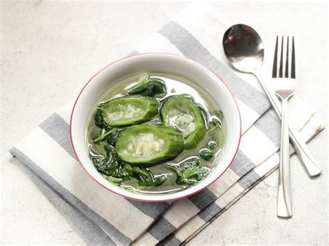 Premium Photo | Sayur bening bayam dan gambas or clear soup of spinach ...