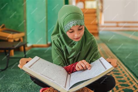 Premium Photo Muslim Girl Reading A Holy Book Quran Inside The Mosque