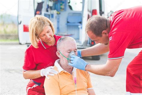 Rescue Team Providing First Aid Stock Photo By William