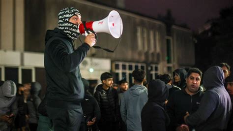 Hundreds of protesters gather outside Rochdale Police Station after ...