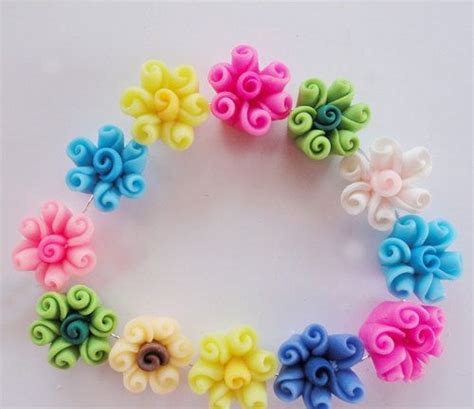 Colorful Beads Are Arranged In A Circle On A White Surface