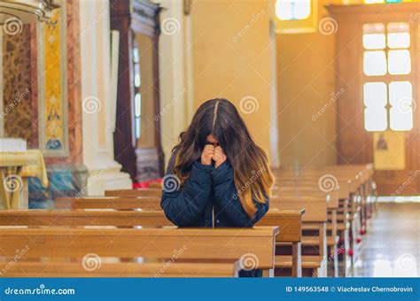 Girl Praying In Church