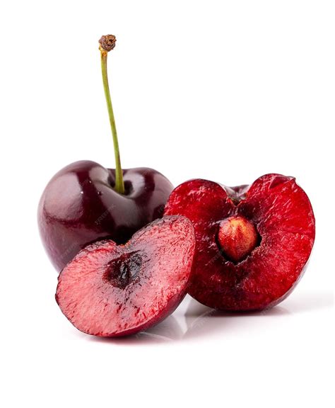 Premium Photo Black Cherry Cut In Half And Isolated On White