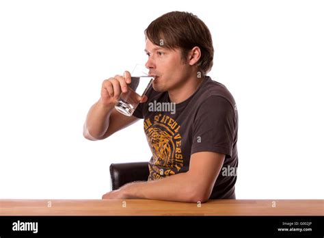 Man drinking water in a glass Stock Photo - Alamy