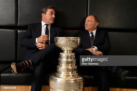 Actor Jon Hamm and Gary Bettman pose with the Stanley Cup at the NHL ...