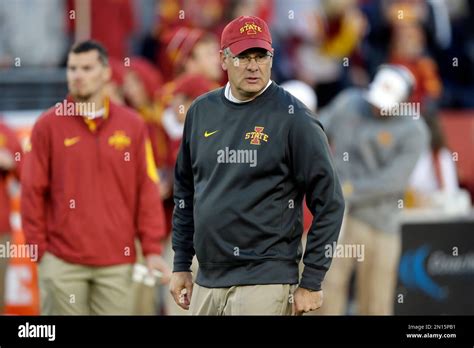 Iowa State Head Coach Paul Rhoads Stands On The Field Before An NCAA