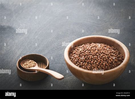 World Food Crisis Concept Empty And Full Old Plate With Buckwheat On A