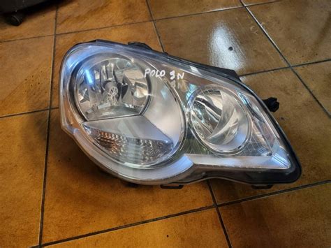 REFLEKTOR PRAWY VW POLO 9N LIFT HELLA 13268683431 Oficjalne