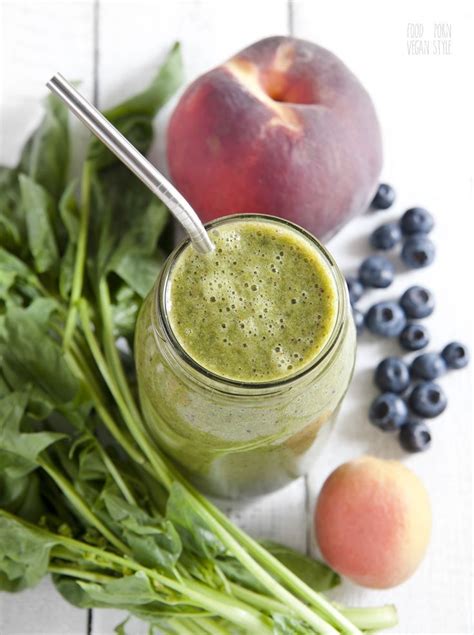 Green Smoothie With Spinach Peach Blueberries Apricot Lemon Ginger And