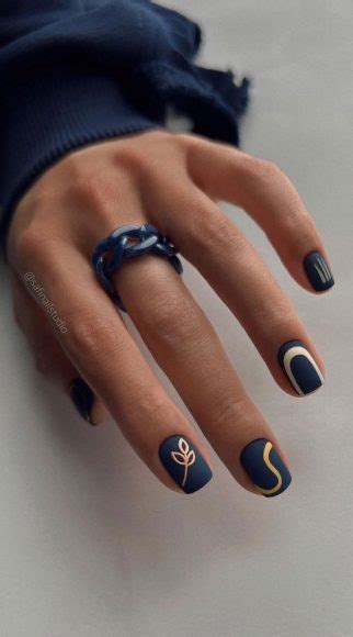 50 Eye Catching Nail Art Designs Blue And Gold Nail Art Design