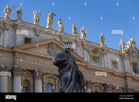 Statue Of St Peter In Front Of The Basilica In Vatican City And Other