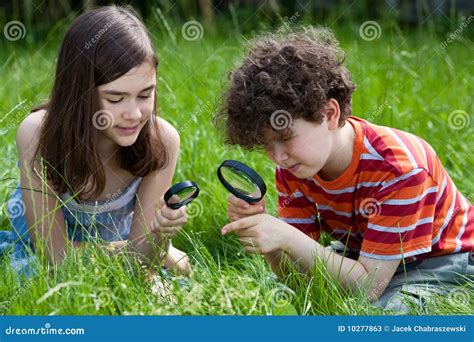 Kids Using Magnifying Glass Stock Image - Image of discover, horizontal ...