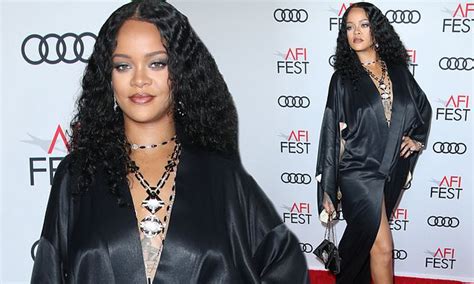 Rihanna Wows In A Racy Waist High Split Black Dress As She Attends