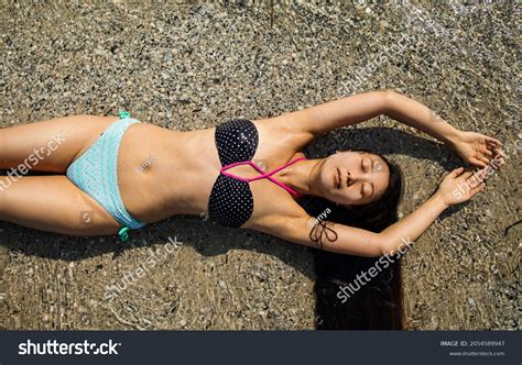Shot Cute Asian Girl Bikini Lying Stock Photo 2054589947 Shutterstock