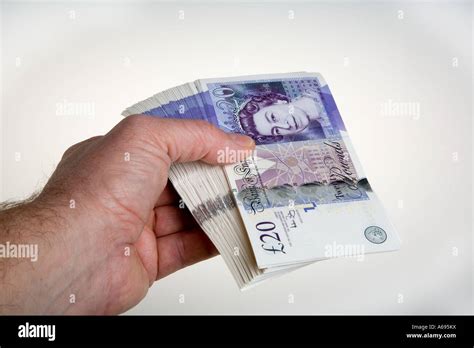 Handing Over Money Uk Hi Res Stock Photography And Images Alamy