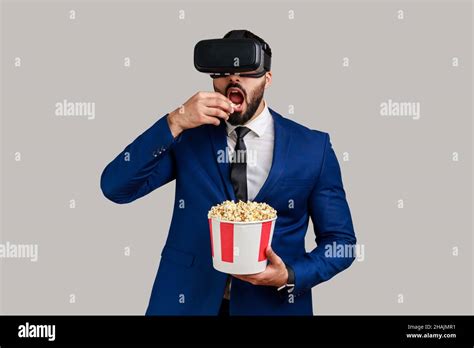 Indian Man Eating Popcorn Watching Hi Res Stock Photography And Images