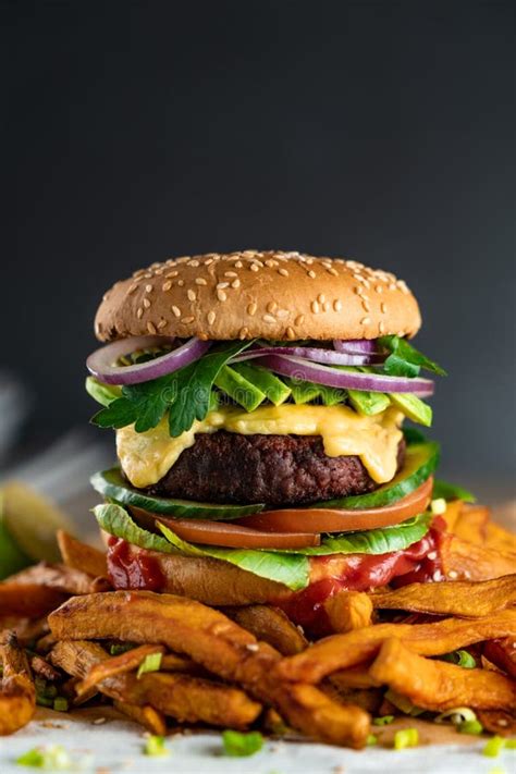 Homemade Plant Based Burger With Sweet Potato Fries Around Vegan