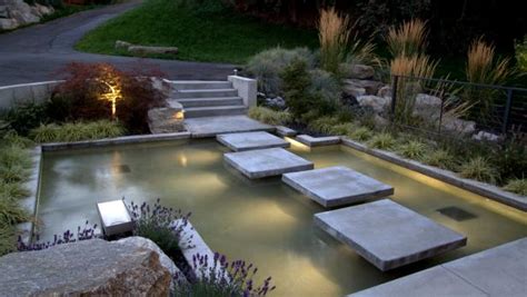 Shimmering Garden Pond With Stepping Stones Alderwood Landscaping Hgtv