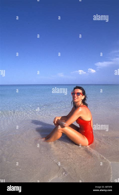 Beach Woman In Red Bathing Suit Stock Photo Alamy