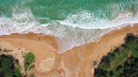 Premium Photo | Aerial drone footage of sea ocean waves reaching ...