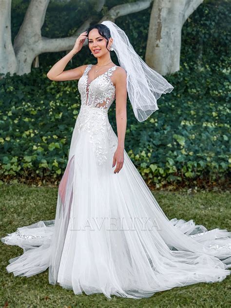 A Line V Neck Appliques Lace Chapel Train Tulle Wedding Dress Laveliya