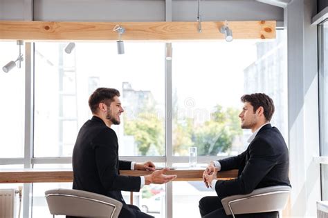 Two Businessmen Having A Discussion Stock Image Image Of Casual