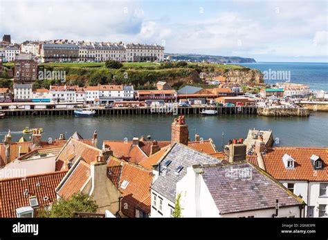 View Of Whitby Harbour Showing Fishing Boats And Private Yachts In The