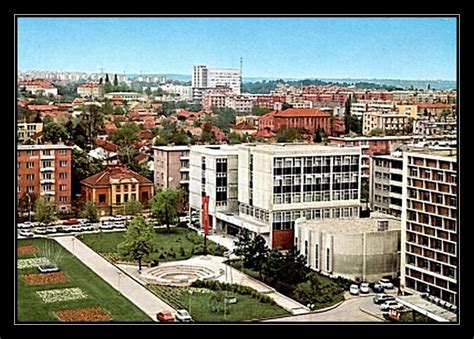 an aerial view of a city with tall buildings and lots of green space in ...