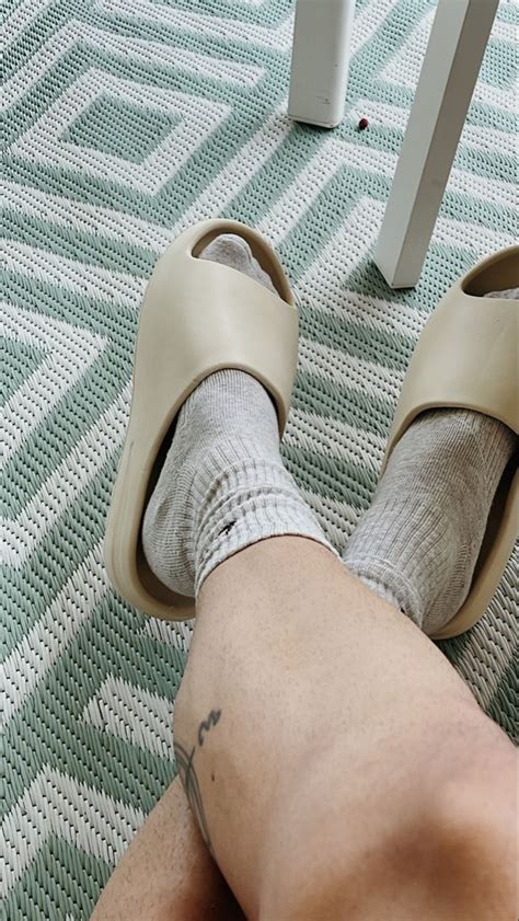 Comfort in yeezy slides by Kanye West. Styled for extra comfort with ...