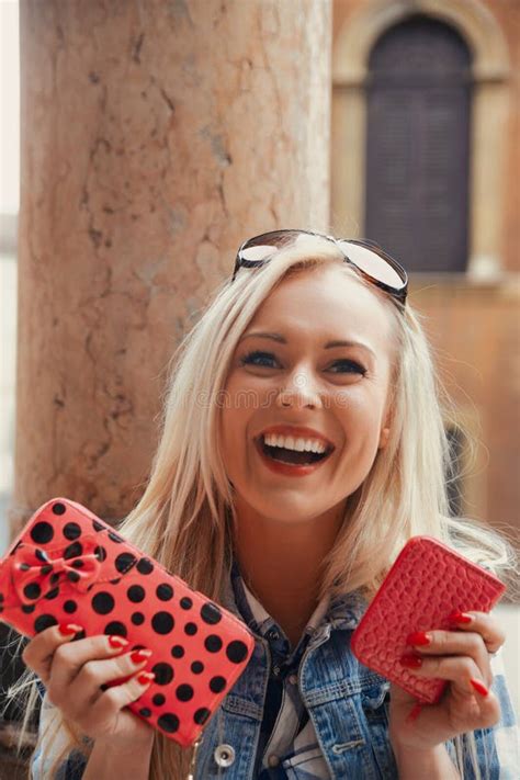Blonde Excitedly Plans Spending Saved Vacation Money Stock Photo Image Of Tourist Savedup