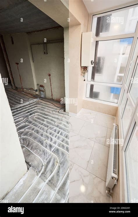 Comparison Of Old Room With Underfloor Heating Pipes And New Renovated