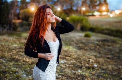 Women Outdoors Hands In Hair Looking Away Open Mouth Delaia