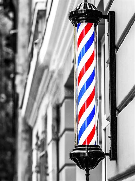 A Classic Barber Logo Barber Shop Pole Logo Of The Barbershop Symbol