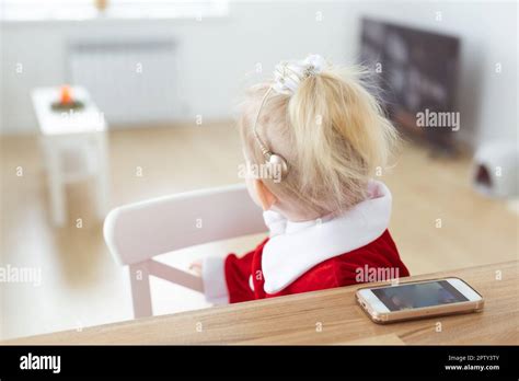 Deaf Child Girl With Cochlear Implant Living Room Deafness Diversity