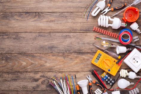 Electrician Equipment on Wooden Background with Copy Space Stock Photo ...