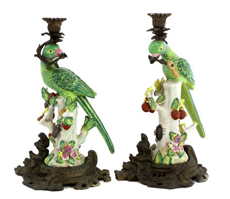 Lot 163 A Pair Of Gilt Brass Mounted Pottery Parrot