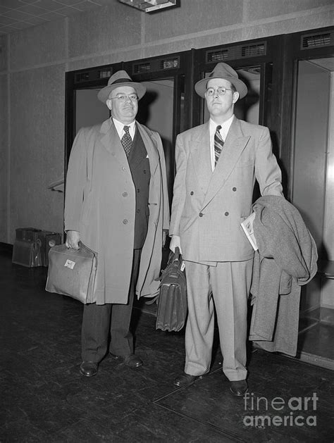 Fbi Special Agents Standing In Airport by Bettmann