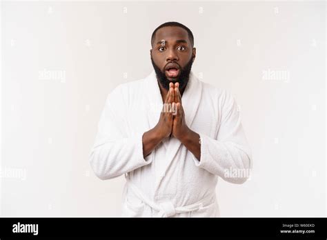 Portrait Of Excited Young African American Male Screaming In Shock And