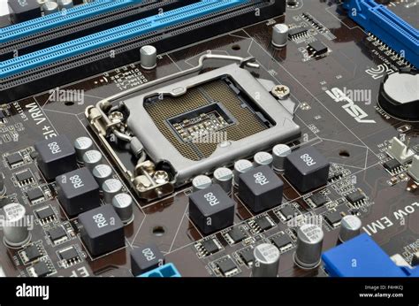 Intel LGA1155 processor socket on an ASUS motherboard Stock Photo - Alamy