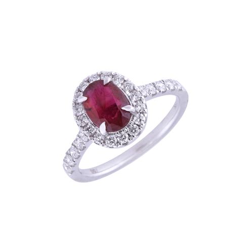 18ct White Gold Oval Ruby 1 60ct Diamond 0 57ct Cluster