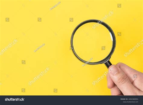 ภาพ ภาพสต็อก วัตถุ 3 มิติและเวกเตอร์เกี่ยวกับ Man Hand Holding A Classic Style Magnifying Glass