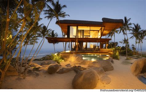 A Modern Beach House in Canggu, Indonesia With an Exposed Wood and Stone Exterior and a Bamboo ...