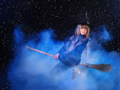 Witch Flying On Broomstick. Stock Photo - Image of childhood, dress ...