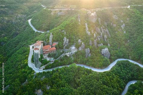 Meteora Monastery of Roussanou, illuminated of rising sun. Aerial ...