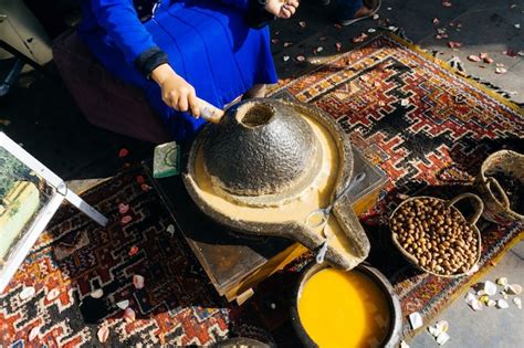 Premium Photo | Argan oil making of argan oil from argan nuts and seeds ...