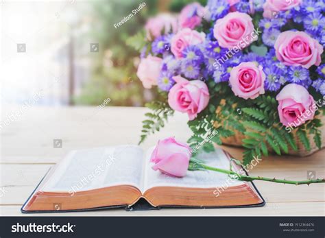 Open Bible With Flowers