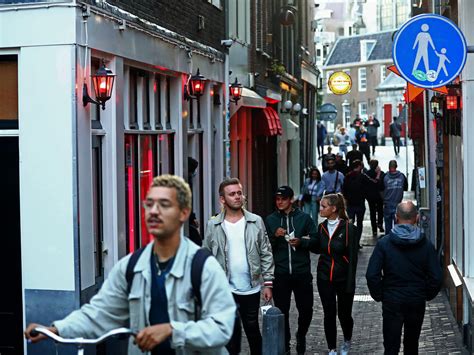 Amsterdam Will Ban Cannabis Outdoors In Its Red Light District