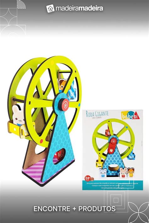 A Wooden Toy With An Image Of A Wheel On It And A Box For The Game