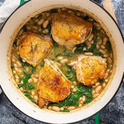 Skillet Chicken Thighs With Spinach And White Beans Basil And Bubbly