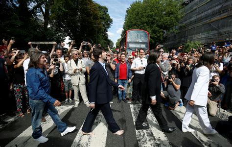 Fans recreate Beatles’ Abbey Road cover shot 50 years on | CANVAS Arts